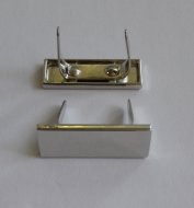 Placka pod logo 25x9 ponikl